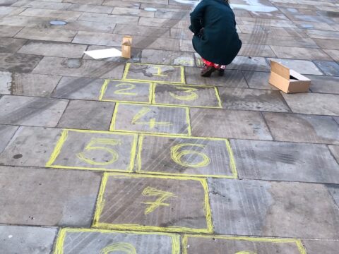 View article Quick enough to count all the hopscotch players in this video?