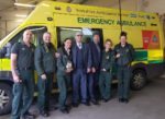 West Hull ambulance staff with Gary Lloyd, centre, Rachel Pippin, centre left, and Mark MvEgan, centre right.