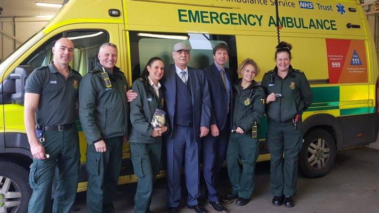 West Hull ambulance staff with Gary Lloyd, centre, Rachel Pippin, centre left, and Mark MvEgan, centre right.