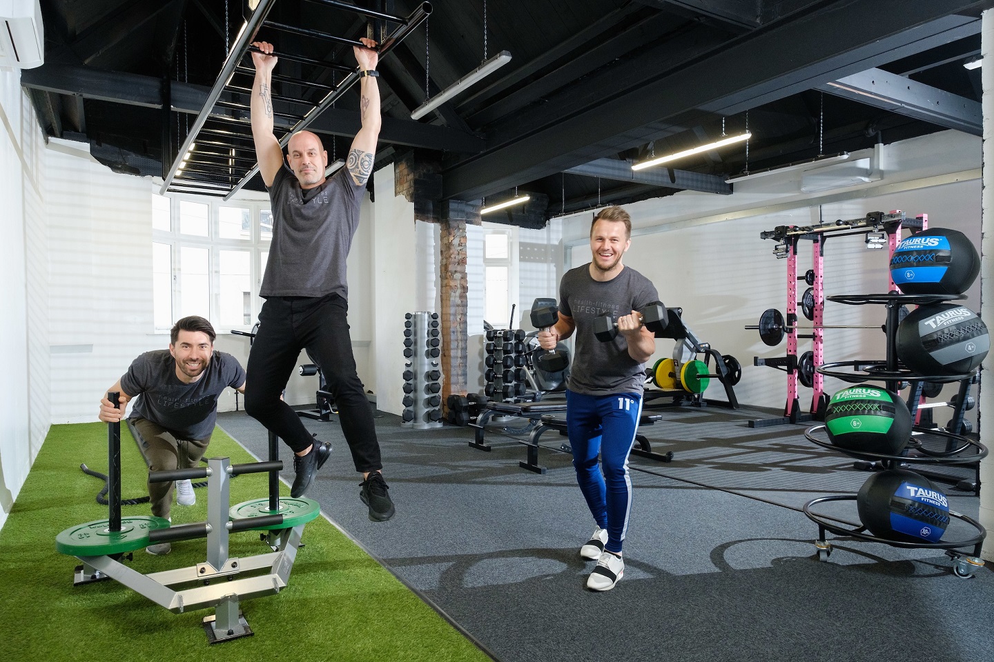 From left, owners Riccardo Seaton, Dale Robinson and Wayne Audsley try out the equipment at The Temple @ Humber Street.