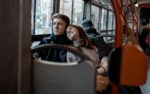 A man and woman on a bus