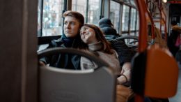 A man and woman on a bus