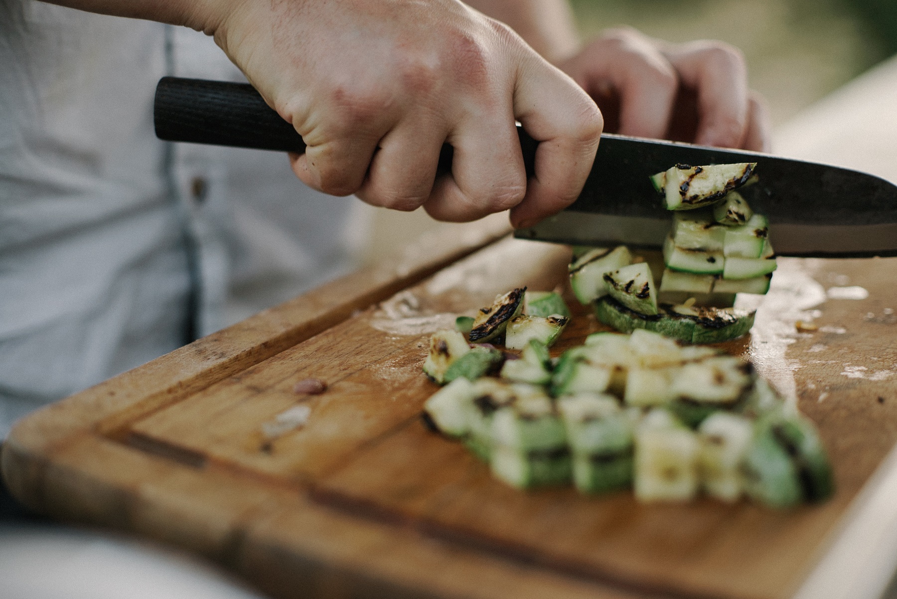 A chef chopping vegetables
