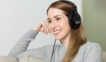 A woman wearing headphones