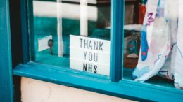 A sign saying 'thank you NHS' in a window