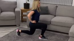 A fitness coach working out in a living room