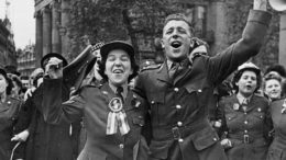 Two people celebrate VE Day in 1945.