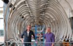 Nigel Larkin and Phil Rye with the Cambridge fin whale during installation