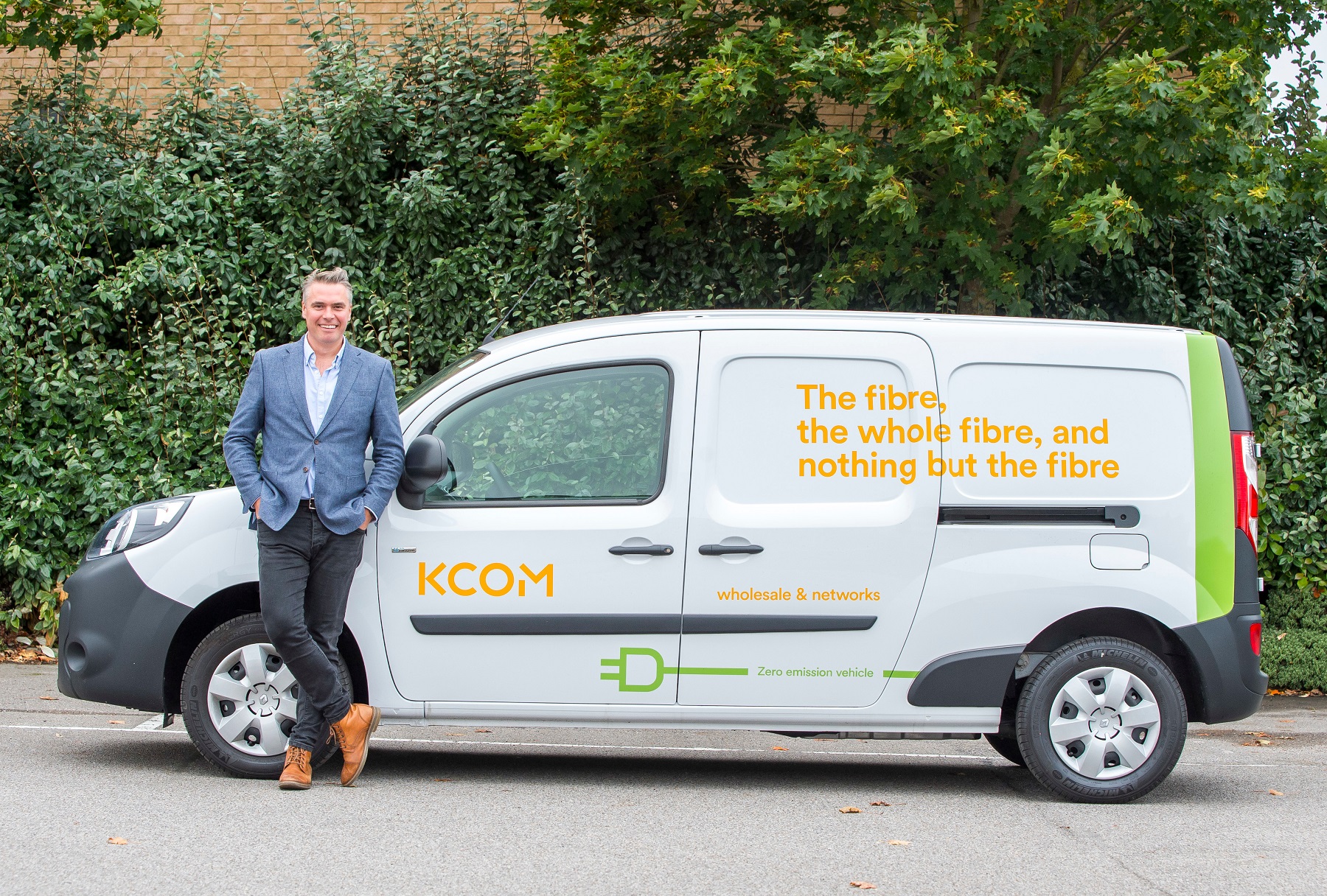Tim Shaw, managing director of KCOM Wholesale & Networks, with a van from the new fleet.