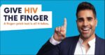 Celebrity Doctor Ranj Sing poses in front of a plain blue background. He is smiling and pointing to bright orange and blue text, which says: Give HIV the finger. A finger-prick test is all it takes