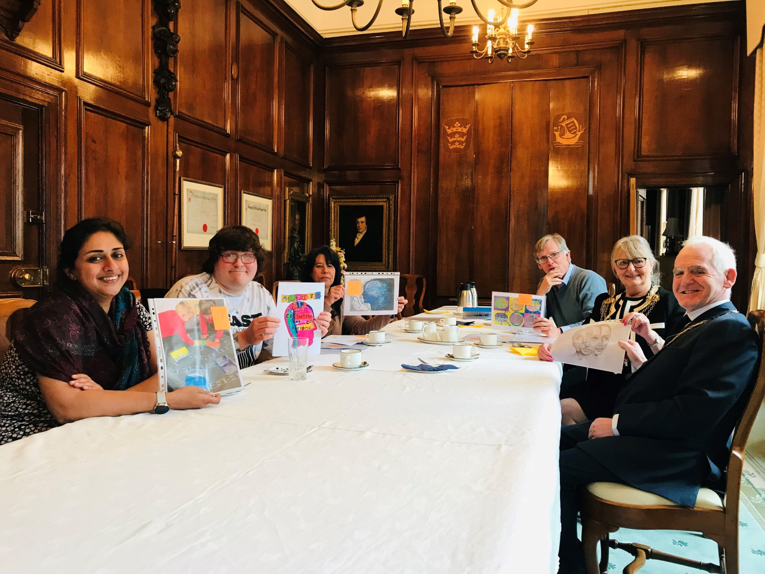 The 2022 judging panel with the five winning entries, from L-R, Councillor Aneesa Akbar, Luke Garner, Sue Pleasance from HCAL, Councillor John Fareham, Lord Mayor of Hull Councillor Lynn Petrini and the Lord Mayor Consort Graham Petrini.