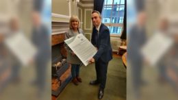 Councillors Mike Ross and Julia Conner signing the Yorkshire and Humber Climate Action Pledge.