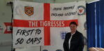 Carol Thomas in front of an England and Hull City flag
