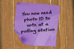 An illustration of a purple sticky note with the word "You now need photo ID to vote at a polling station"