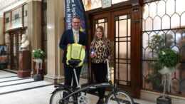 Bike Lights for Dark Nights flag, with Hull City Council staff, a bike and cycle accessories