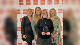 From left to right is Laura Gawthorpe, Marketing, Recruitment and Information Officer – Fostering and Adoption at Hull City Council, Destiny, Pam and Susanne Hayes, Fostering Social Worker at Hull City Council. All are smiling while Pam holds her award.