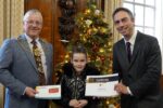 L-R: The Lord Mayor of Kingston upon Hull and Admiral of the Humber, Councillor Kalvin Neal, Jessica the competition winner from Stoneferry Primary School and the Leader of Hull City Council, Councillor Mike Ross.