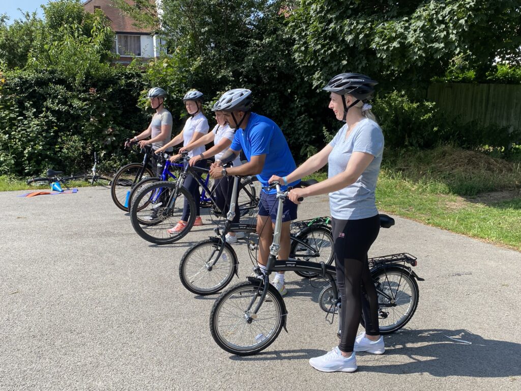 A group of adults taking part in a Rusty Riders cycle training session