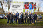 Cllr Rob Pritchard (fifth left) with fellow West Carr ward councillors and members of Hull City Council's major projects team, Hull Esteem, Geo. Houlton & Sons and Kingswood United in front of the Bude Park plans sign.