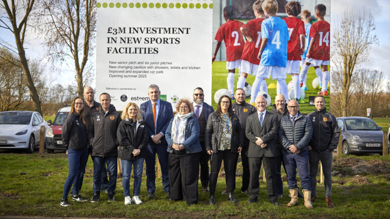 Cllr Rob Pritchard (fifth left) with fellow West Carr ward councillors and members of Hull City Council's major projects team, Hull Esteem, Geo. Houlton & Sons and Kingswood United in front of the Bude Park plans sign.