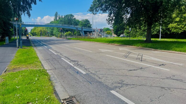 Boothferry Road, Hull. Images shows the outbound on-road cycle lane, with the Boothferry Road footbridge in the distance.