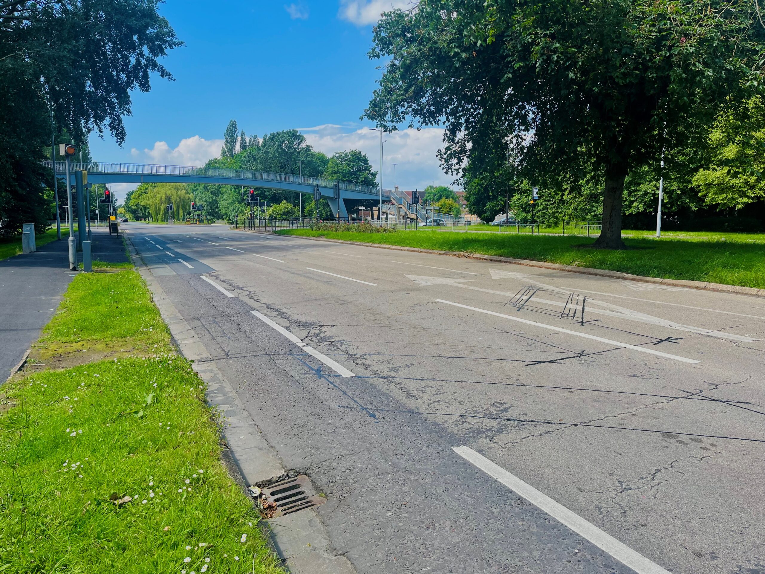 Boothferry Road, Hull. Images shows the outbound on-road cycle lane, with the Boothferry Road footbridge in the distance.