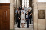 Multiply partners stood on the steps inside the Guildhall.