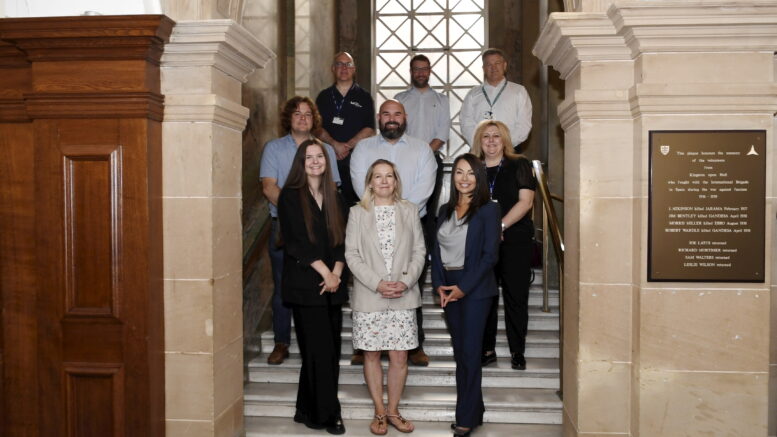 Multiply partners stood on the steps inside the Guildhall.