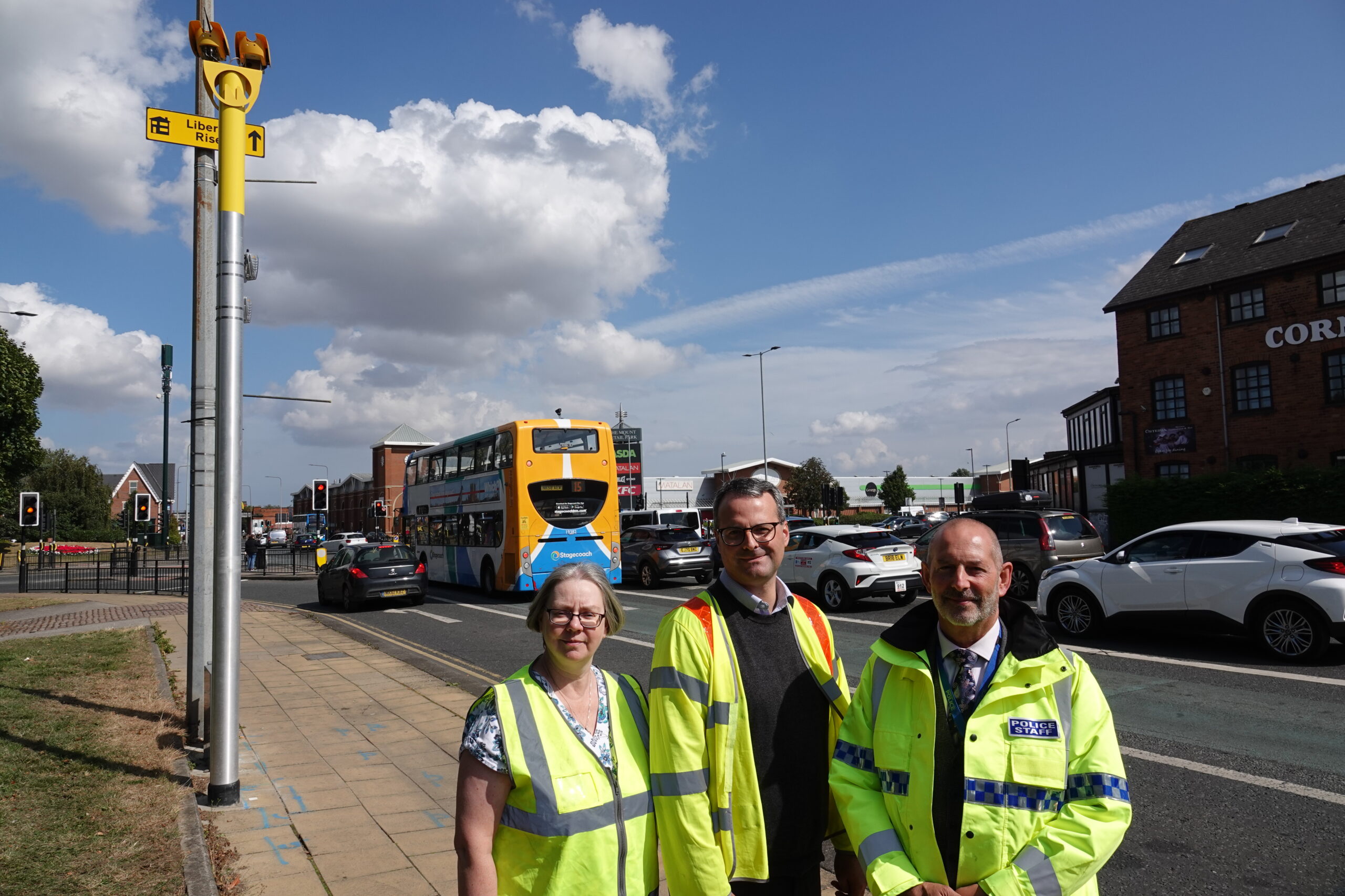 Councillor Mark Ieronimo (centre) with Ruth Gore (left) and Ian Robertson (right) from Safer Roads Humber at the Mount Pleasant Holderness Road Junction