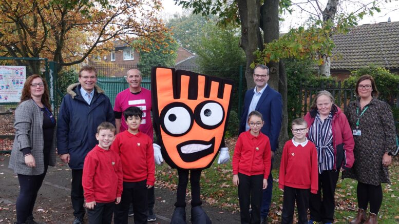 Representatives from Living Streets and Hull City Council with staff and students at Chiltern Primary School.