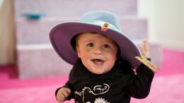 An image of a child wearing a hat.