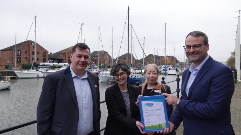 Councillor Mark Ieronimo presents the team from Holiday Inn Hull Marina with their latest Modeshift STARS certificate.