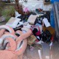 piles of rubbish in a street