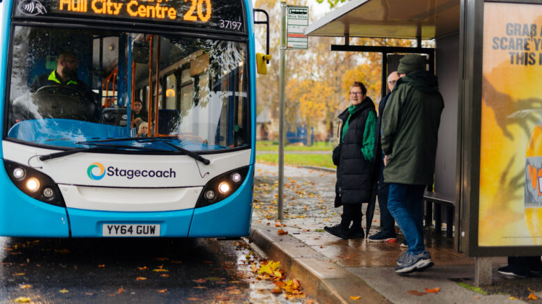 A Stagecoach bus picking up passengers at a bus stop in Hull