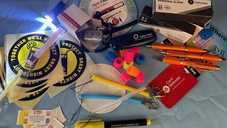 the collection of safety items contained in the goody bag, laid out on a table. The list is included in this article.