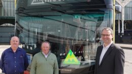 Eden Blyth, Councillor Paul West and Councillor Mark Ieronimo with the Moorsbus (M1) service at Hull Paragon Interchange