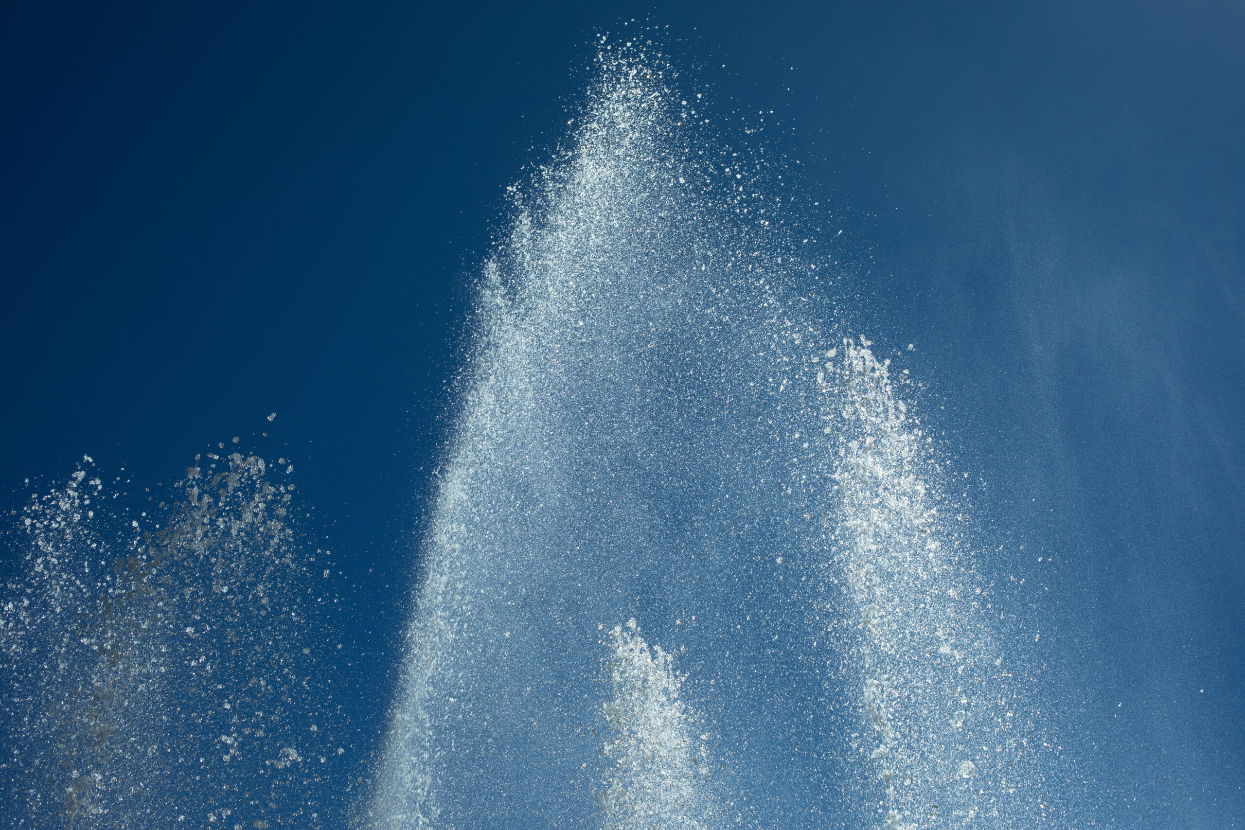 Jets of water against sky. Photo credit; Adobe Stock.
