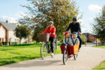 A family cycling in Kingswood in Hull
