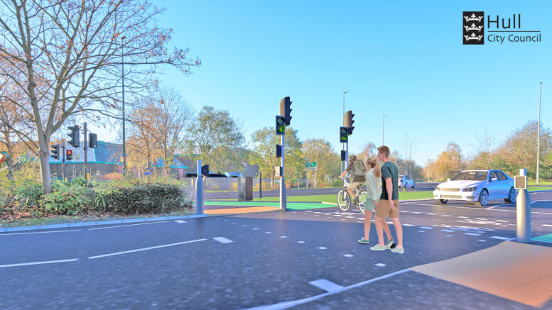 People and cyclists crossing the road to Ennerdale Leisure Centre
