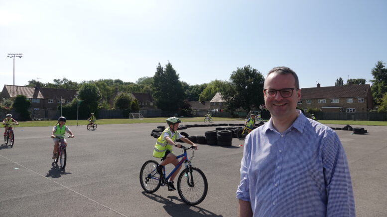 Councillor Mark Ieronimo visiting Rokeby Park Primary School during a Bikeability training session delivered