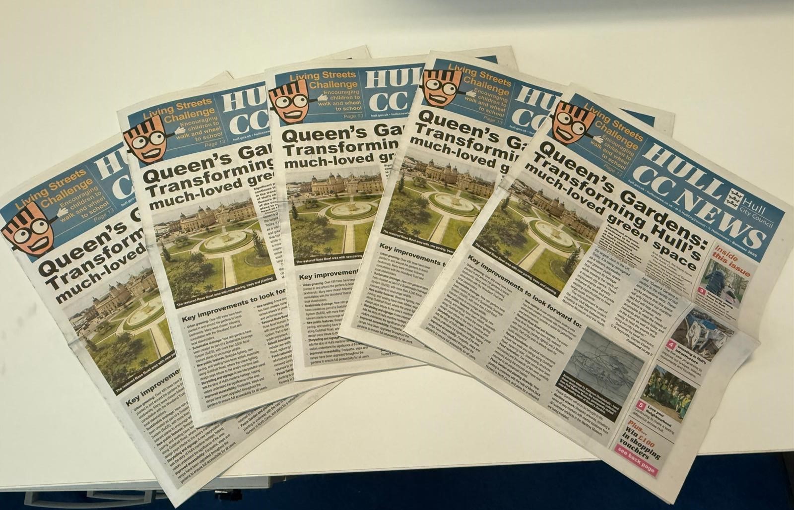Multiple copies of the summer 25 edition of Hull CC News are seen on a white background