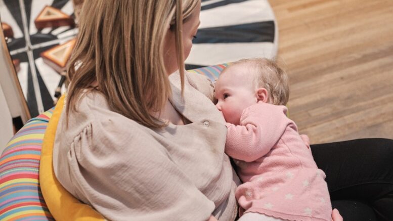 Mother breastfeeding her baby.
