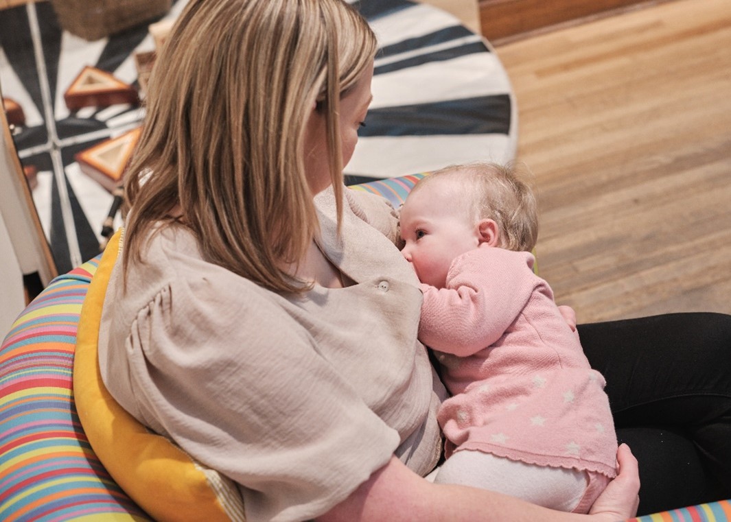 Mother breastfeeding her baby.