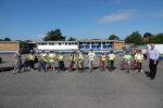 Children at Rokeby Park Primary School during a Bikeability training session with Councillor Tracey Henry (left) and Councillor Mark Ieronimo (right)