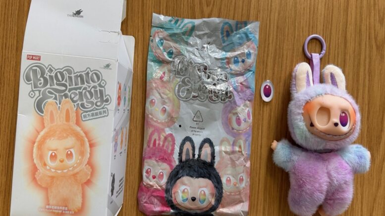 An image showing a counterfeit toy. Its eye has fallen out of the socket