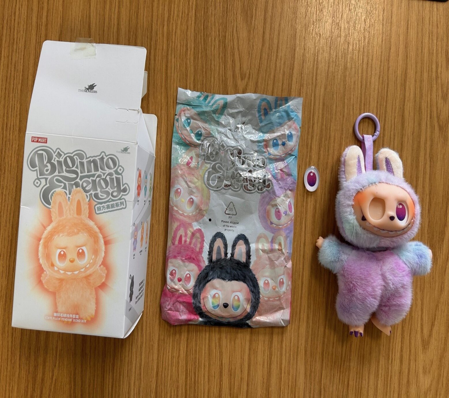 An image showing a counterfeit toy. Its eye has fallen out of the socket