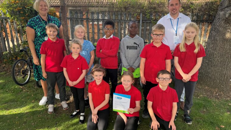 Staff and students at Chiltern Primary School are presented with their Modeshift STARS Good Travel Plan certificate