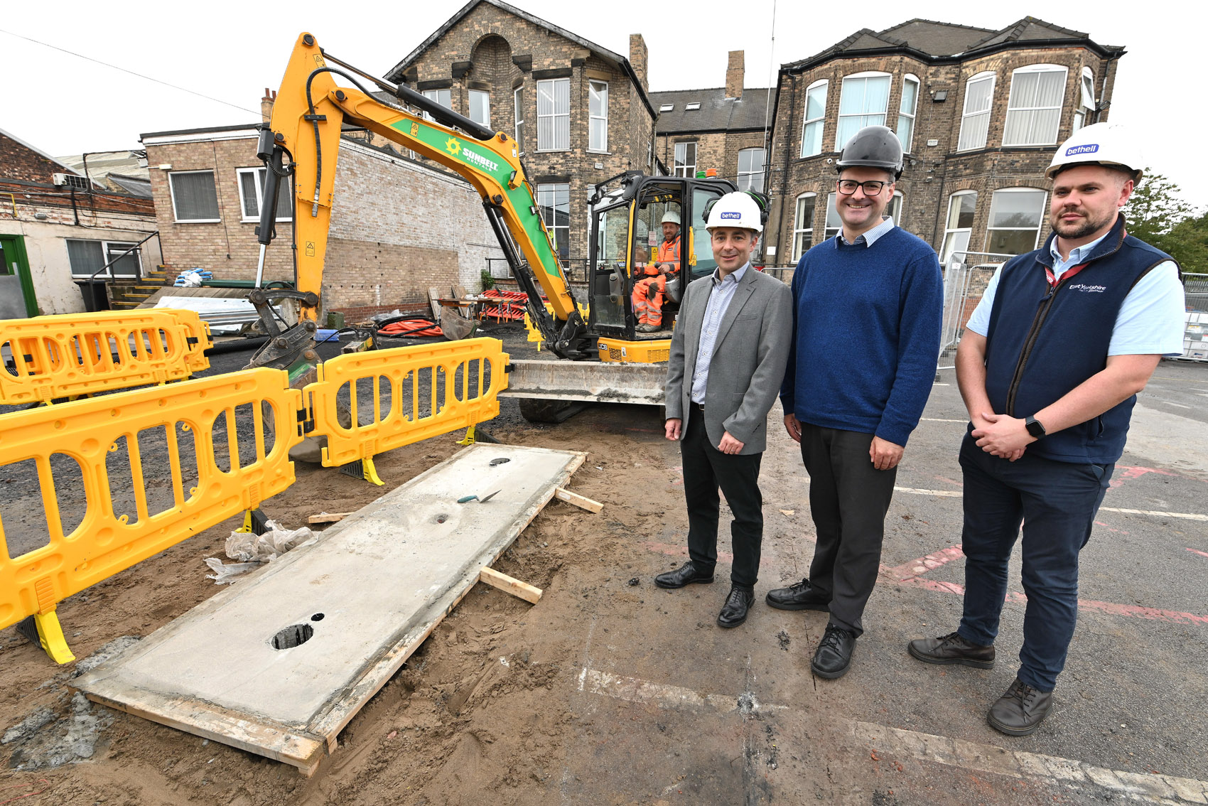Ben Gilligan of East Yorkshire Buses with Councillor Mark Ieronimo and Andrew Benstead, the bus operator’s engineering director, at the start of the second phase of the (EV) infrastructure programme