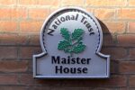 A close-up of the sign on the National Trust-owned Maister House.