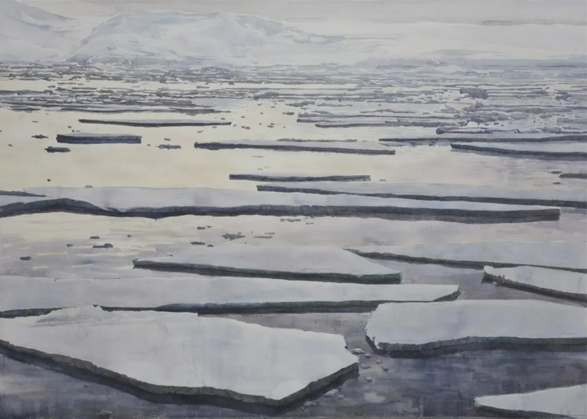 an image of water with sheets of cracked ice on top